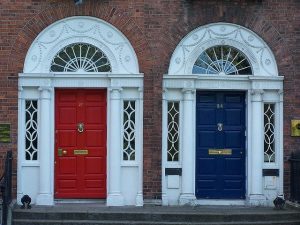 2 front doors, one red and one blue